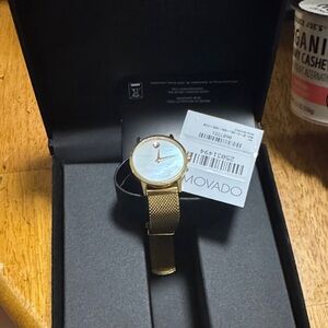 Movado Gold Watch with Black Band
